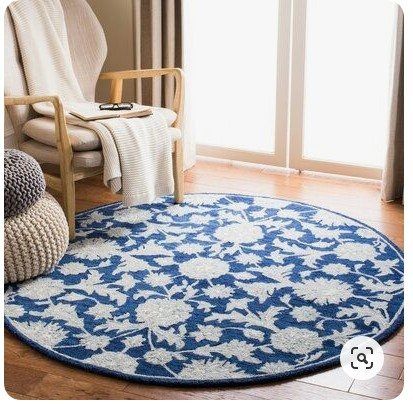 Charlton Home Cryal Handwoven Wool Navy Round Carpet