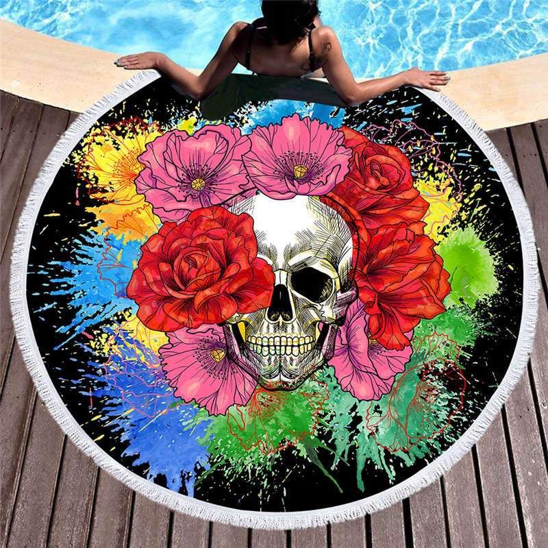 Flowers And Colorful Colors Surround The Skull Round Beach Towel